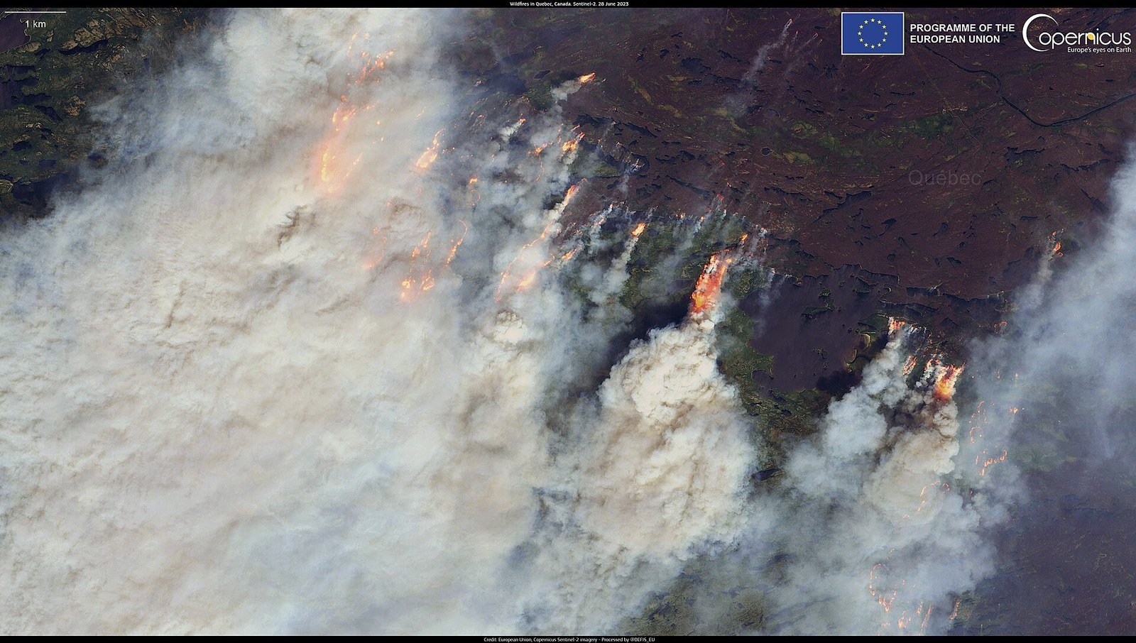 Satellite view of wildfire smoke spreading across Canada